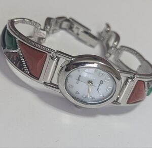Osirock quartz watch featuring a southwestern-style design with colorful enamel